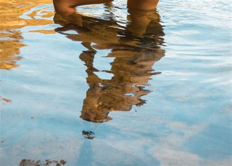 Riflesso di un volto nell'acqua