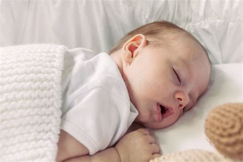 Neonato che dorme